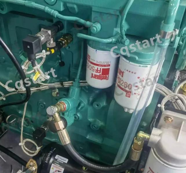 Fuel filter assembly on engine, filters impurities for clean fuel supply.